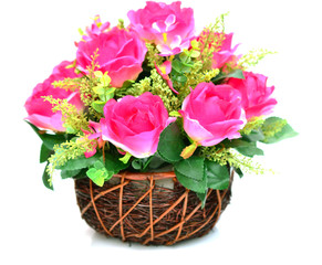 Fototapeta na wymiar artificial flowers in basket isolate on white