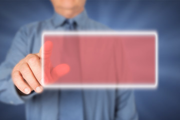 Businessman touching virtual screen.