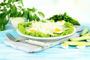 Delicious salad with eggs, cabbage and cucumbers