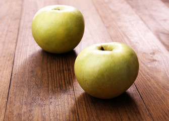 Apples on wooden background