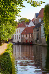 Fototapeta na wymiar Classic view of channels of Bruges.