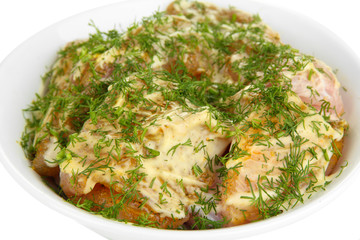 Turkey meat with spices in bowl close up