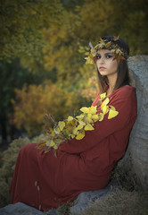 Elf in autumn forest