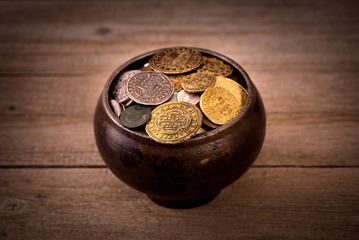 Pot of various coins