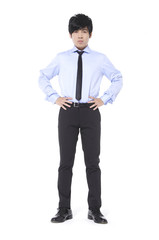 Full body young businessman. Vertical shot.