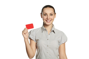 Young girl smiling and holding a card