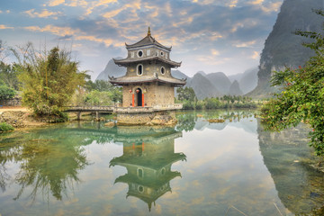 The wrenching  tower in guangxi, China. - obrazy, fototapety, plakaty