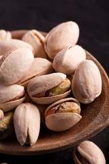 healthy salted pistachios in a nutshell