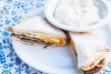 sandwich with meat served with rice