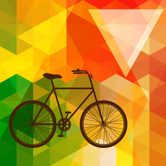 Fototapeta premium Silhouette of an old bicycle on a colorful mosaic background