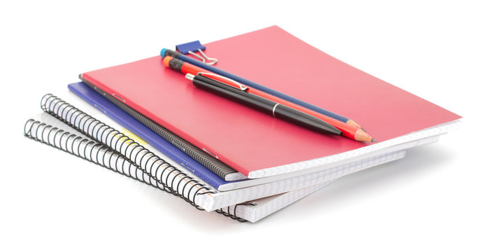Notebook stack and pencils. Education and studies accessories.