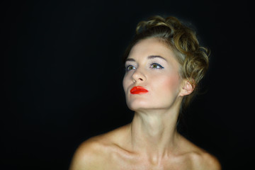 Portrait of woman with her head held high