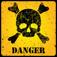 Yellow danger sign with skull