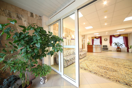 Entrance door to coridor with reception area