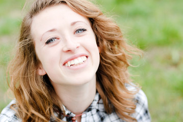 Smiling teenage girl had shot portrait