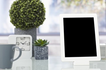 Closeup photo of tablet on desktop