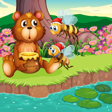 A big bear and bees at the riverbank