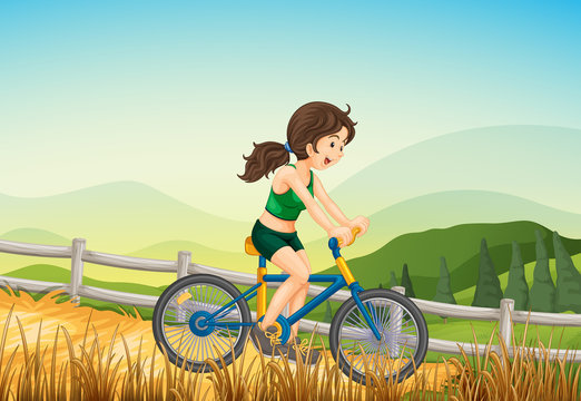 A girl biking at the farm