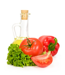 sunflower oil in a bottle with vegetables