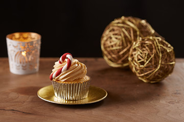 Candy bar cupcake on Christmas background
