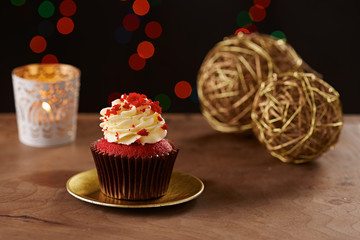 Red velvet cupcake on Christmas background