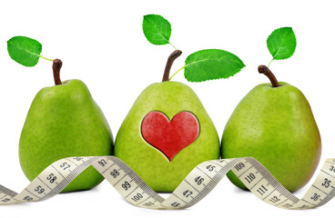 green pears with heart and measuring tape
