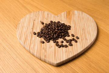 Dark Coffee Beans on Heart Shaped Chopping Board