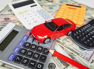 Car money and calculator.