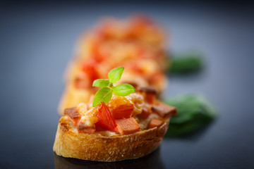 bruschetta with cheese and tomatoes