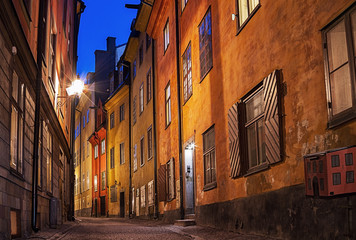 Gamla stan in Stockholm at night. - obrazy, fototapety, plakaty