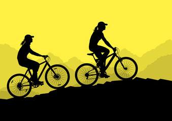 Obraz premium Active cyclists bicycle riders in wild mountain nature landscape