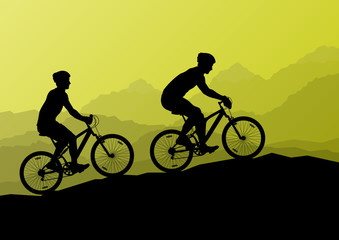 Active cyclists bicycle riders in wild mountain nature landscape