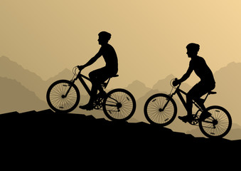 Obraz premium Active cyclists bicycle riders in wild mountain nature landscape