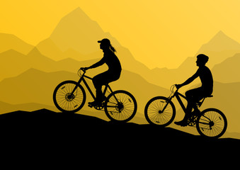 Obraz premium Active cyclists bicycle riders in wild mountain nature landscape