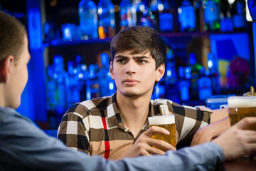 portrait of a young man at the bar