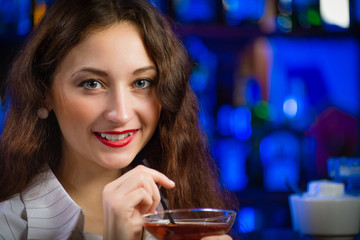 young woman in a bar
