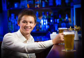 portrait of a young man at the bar