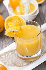 Obraz na płótnie Canvas Fresh made Orange Juice