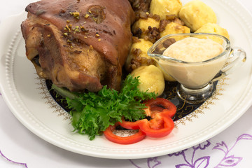 grilled knuckle of pork with potato dumplings