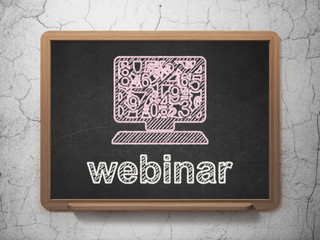 Education concept: Computer Pc and Webinar on chalkboard
