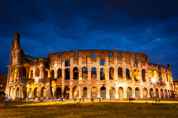 Fototapeta na wymiar Colosseum in Rome by night, close up, architecture details