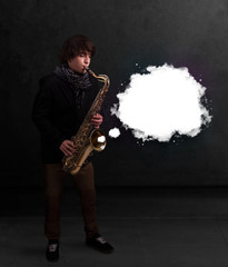 Young man playing on saxophone with copy space in white cloud