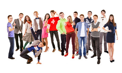 Fototapeta premium Large group of happy multicolored dressed teenagers on the white