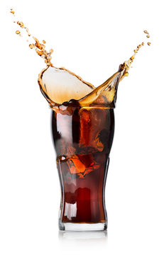 Splash of cola in a glass