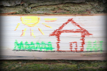 Dom narysowany na kawałku drewna - obrazy, fototapety, plakaty