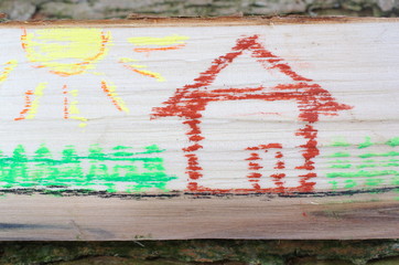 Fototapeta Dom narysowany na kawałku drewna obraz