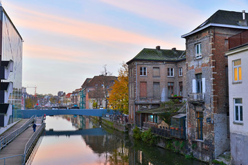 Fototapeta na wymiar Old houses with canal of Mechelen at sunset. Belgium.