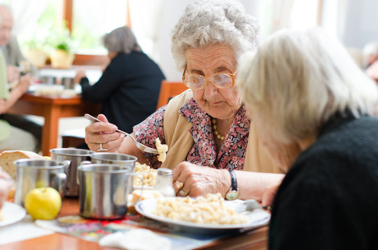 senior woman eating