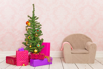 Vintage room with Christmas tree, gifts and chair