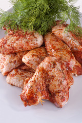  fresh chicken wings with spices and the sauce